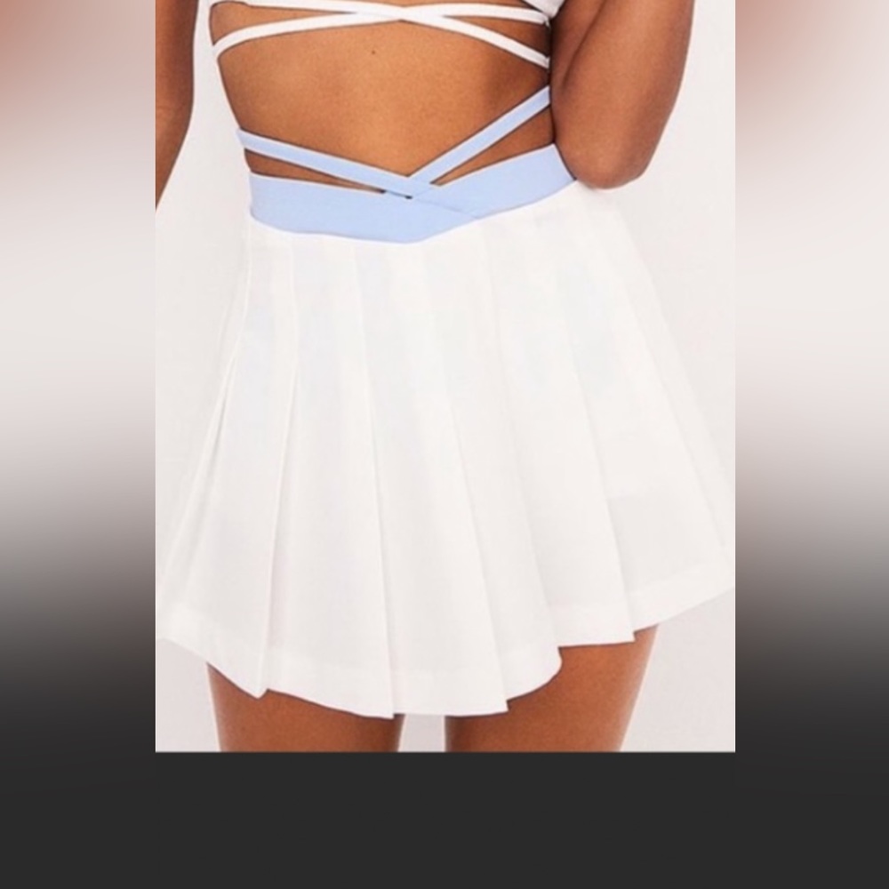 Sophia Tennis Skirt - For Love & Lemons size M but can fit S easily.